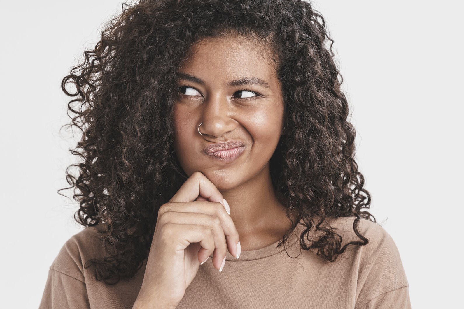 Beautiful African American Woman Thinking over Isolated